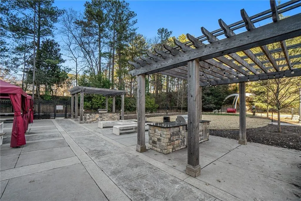 View of terrace featuring a pergola