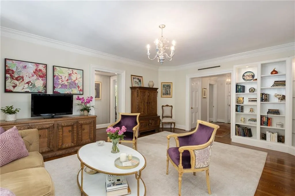 View of Living Room towards foyer and hallway to primary bedroom and office