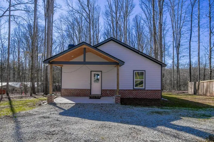View of front of home featuring brick siding