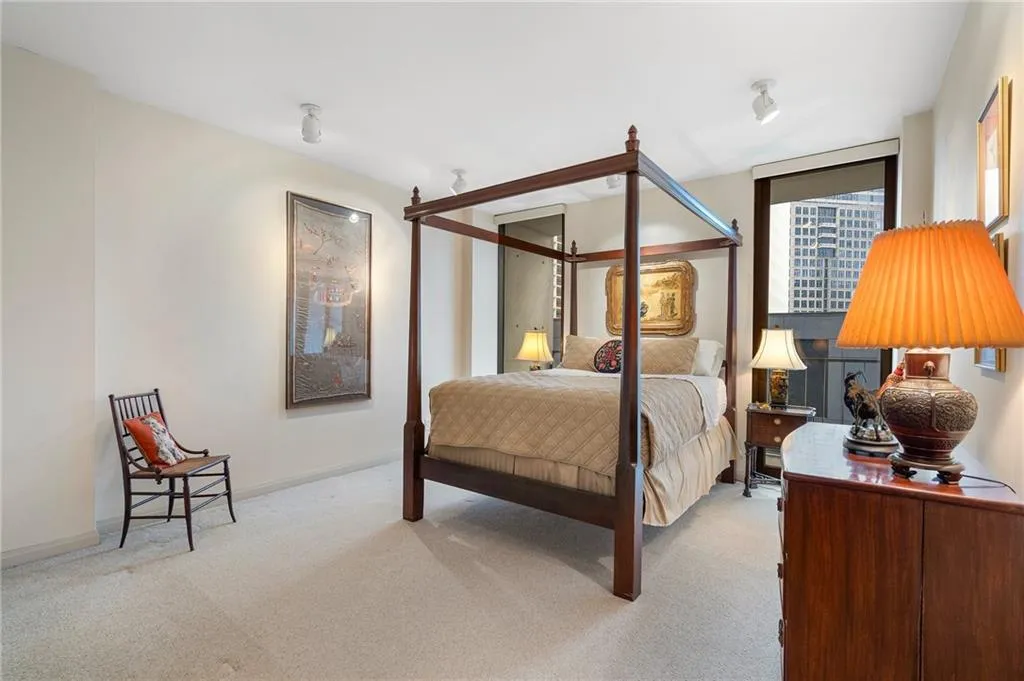 Bedroom with carpet and baseboards