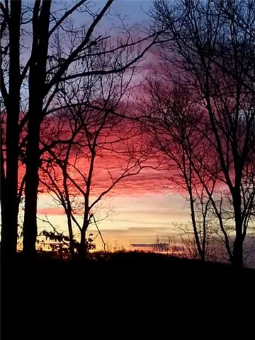his .96 acre lot in Bent Tree, Jasper, Georgia will lend well to a basement floor plan and should have long range mountain views once cleared for building. Sunsets are beautiful from this lot!