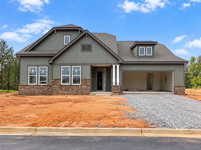 Carrington by McKinley Homes-2,924 Sq. Ft. Spacious ranch-style design featuring open-concept living, a private owner's suite, flex room, covered patio, and 2-car garage.