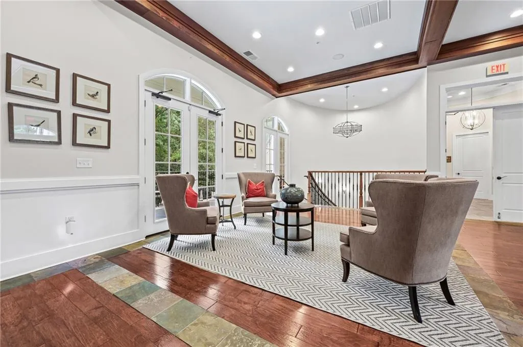 Rich wood-finish flooring with slate tile accents