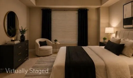 Large primary bedroom with neutral wall tones and neutral colored carpet, adjacent to custom closet system and bathroom.-Evening View