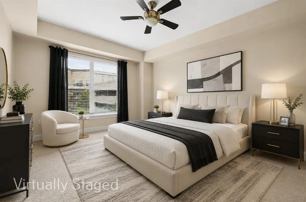 Carpeted bedroom featuring a large window with blinds, ceiling fan, and recessed lighting