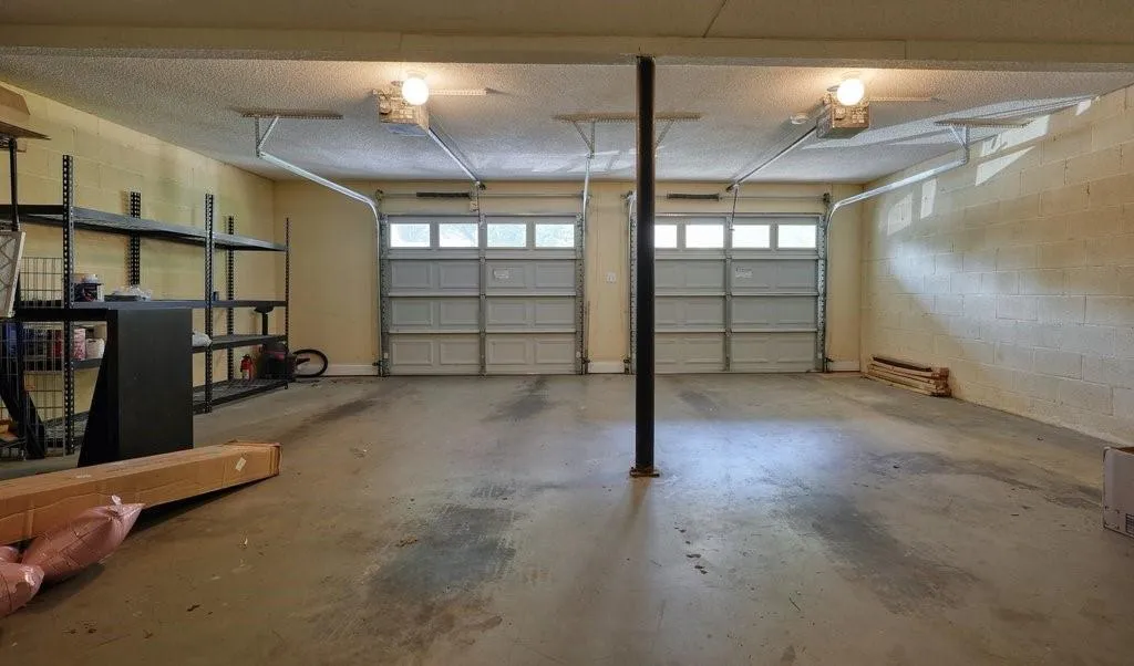 Garage featuring a garage door opener