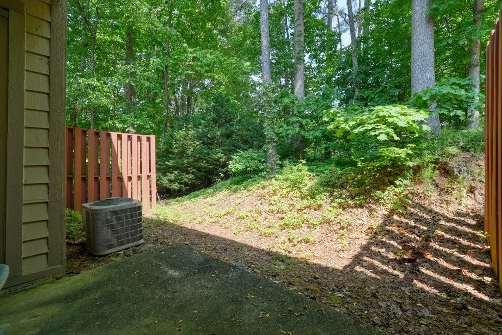 View of yard with central AC