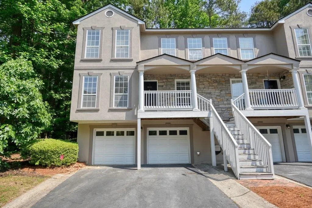 Multi unit property featuring a garage