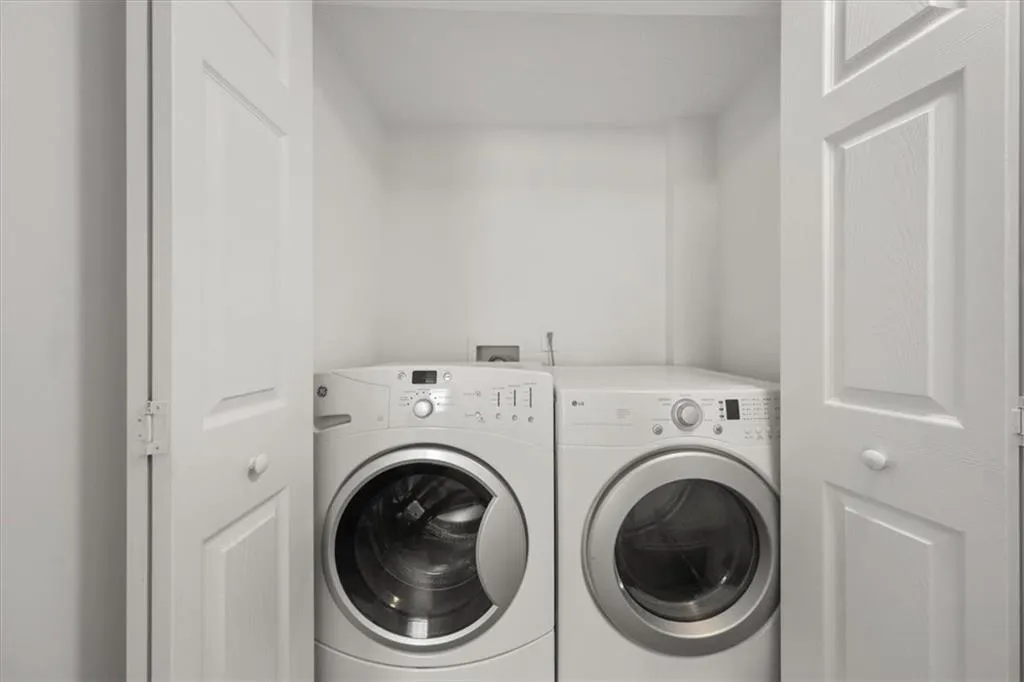 Laundry area featuring independent washer and dryer