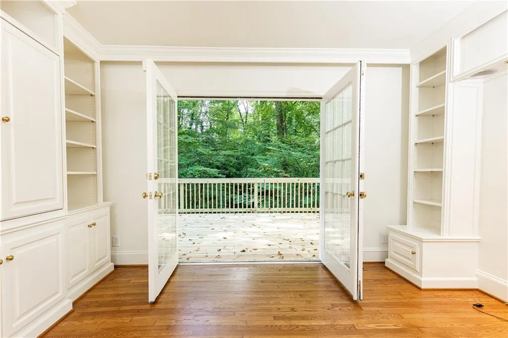 Bonus room with french doors to the generous back deck