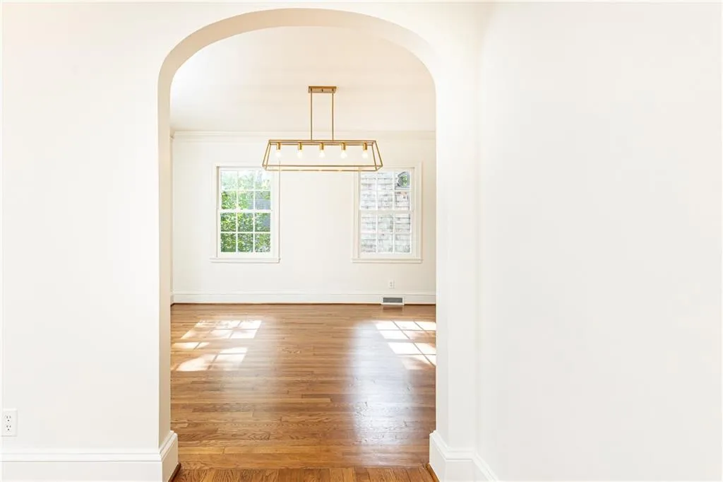 Classic lines and arched interior doorways.