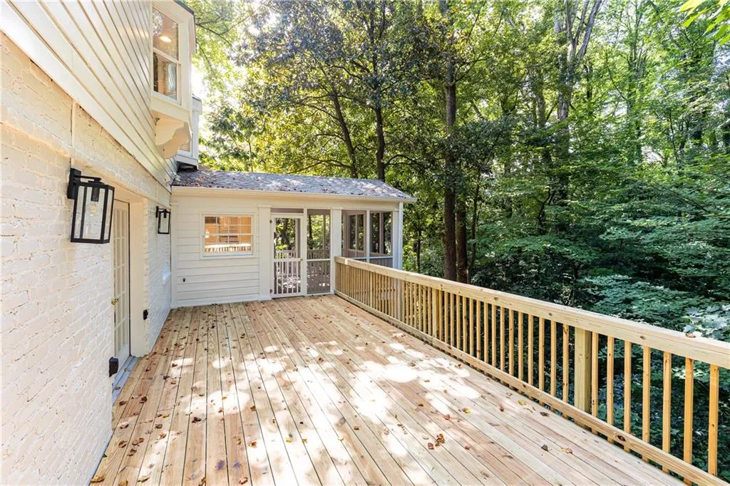 New back deck with a tree house feel is perfect for entertaining.
