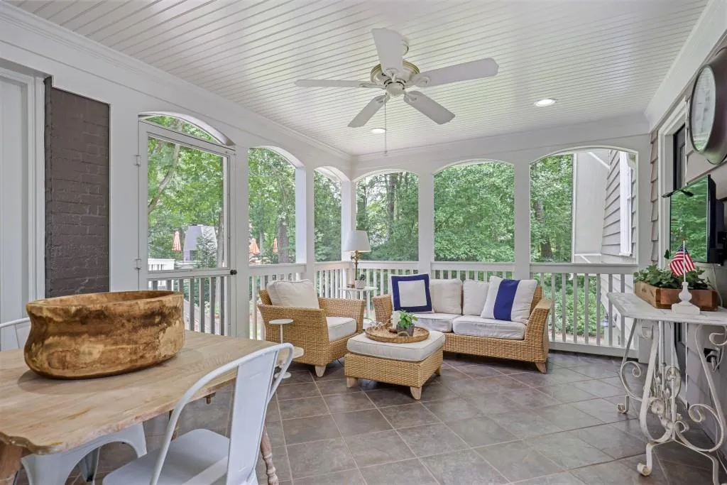Screened Porch connects Carriage house to home