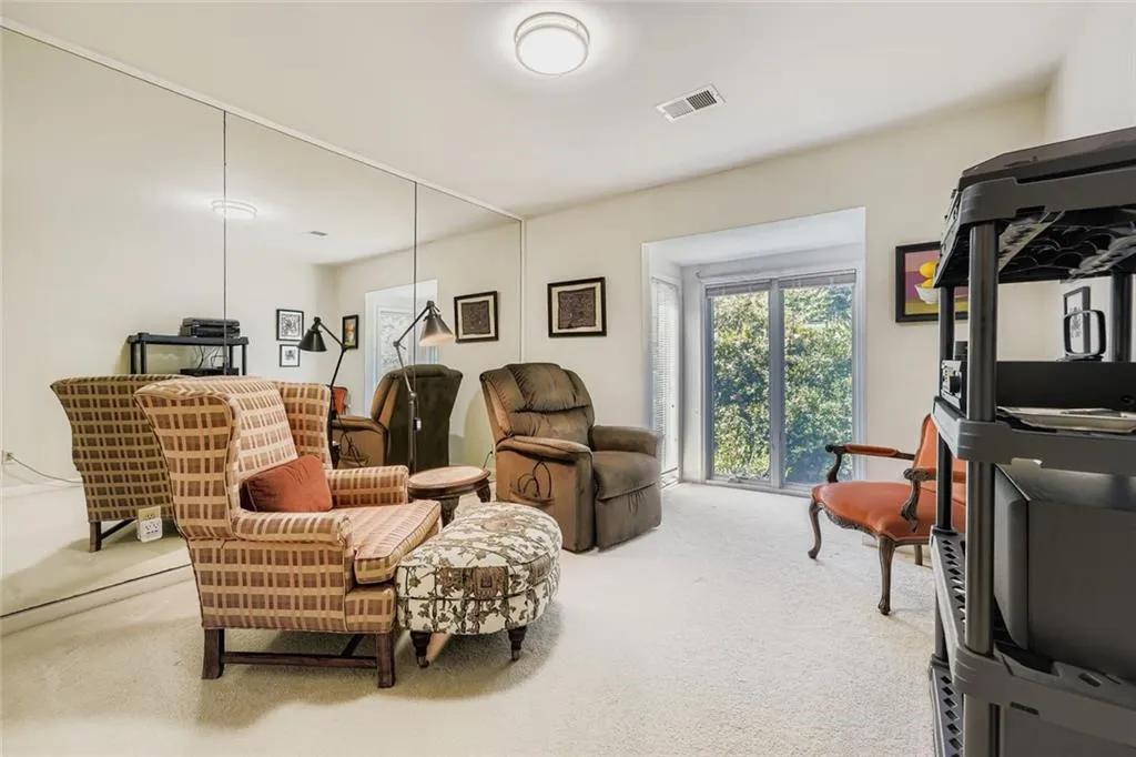 Sitting room with carpet flooring