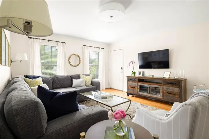 Welcome home to R4! Top floor, end unit filled with natural light.