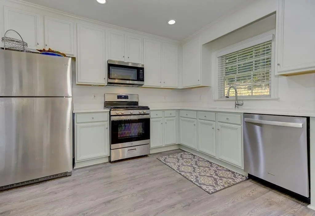 THIS KITCHEN OFFERS GREAT COUNTER SPACE TO PREPARE AN AMAZING MEAL