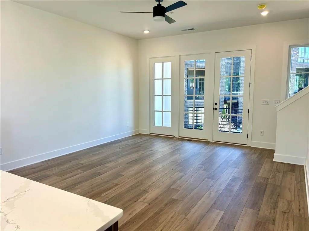 Family room and french doors leading to the large balcony