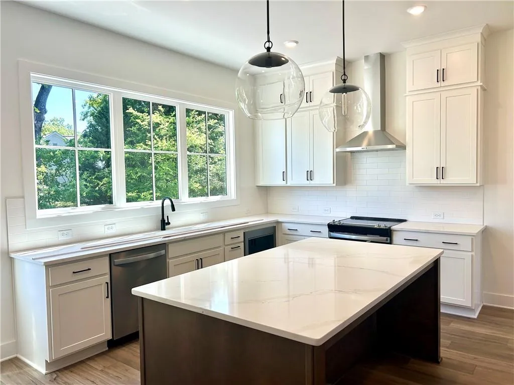 Lots of natural light in this kitchen with views overlooking the trees