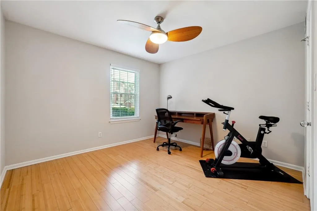 second bedroom used as a gym and office