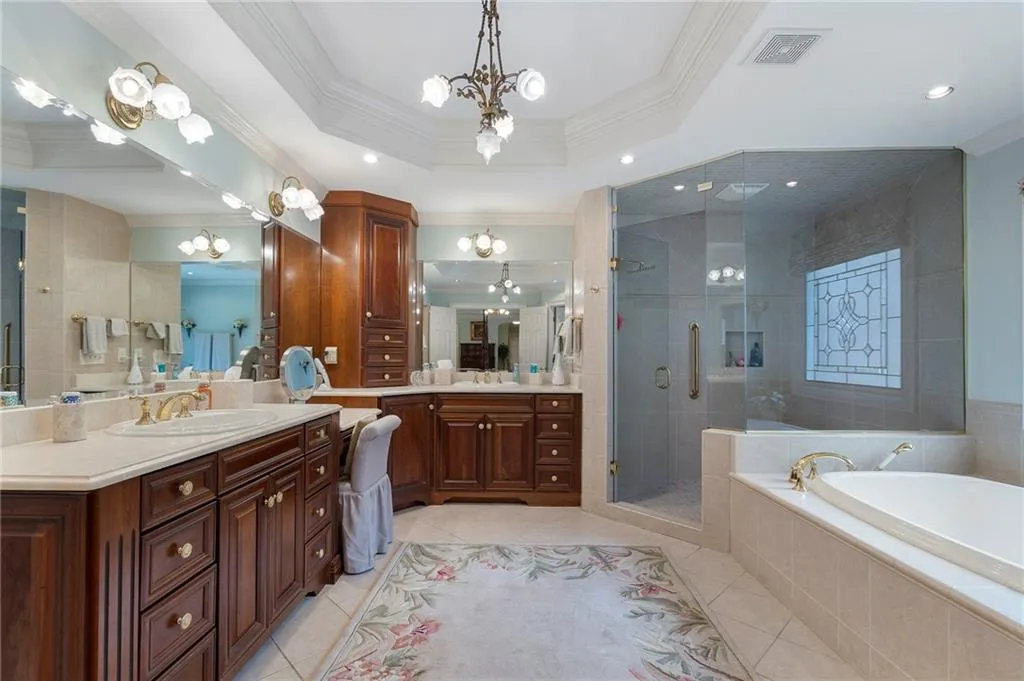 Primary bathroom perfect for a couple and make-up table.