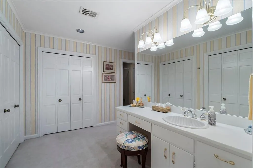 Original primary bather room with good closets.