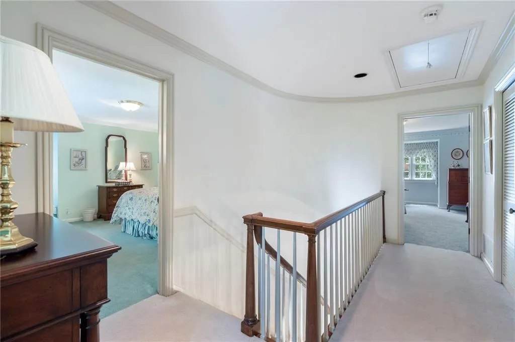The is the stairs leading to the second level with 3 large bedrooms and 2 full bathrooms