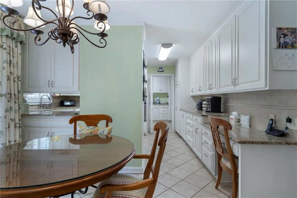 This picture shows just how much cabinets space there is in the kitchen