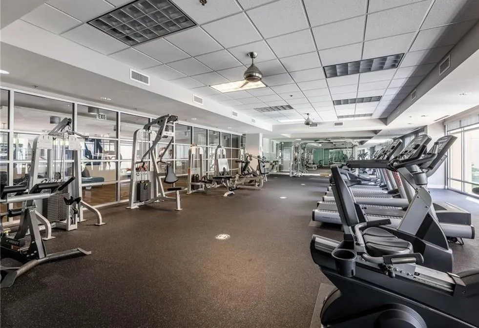 Workout area with a paneled ceiling