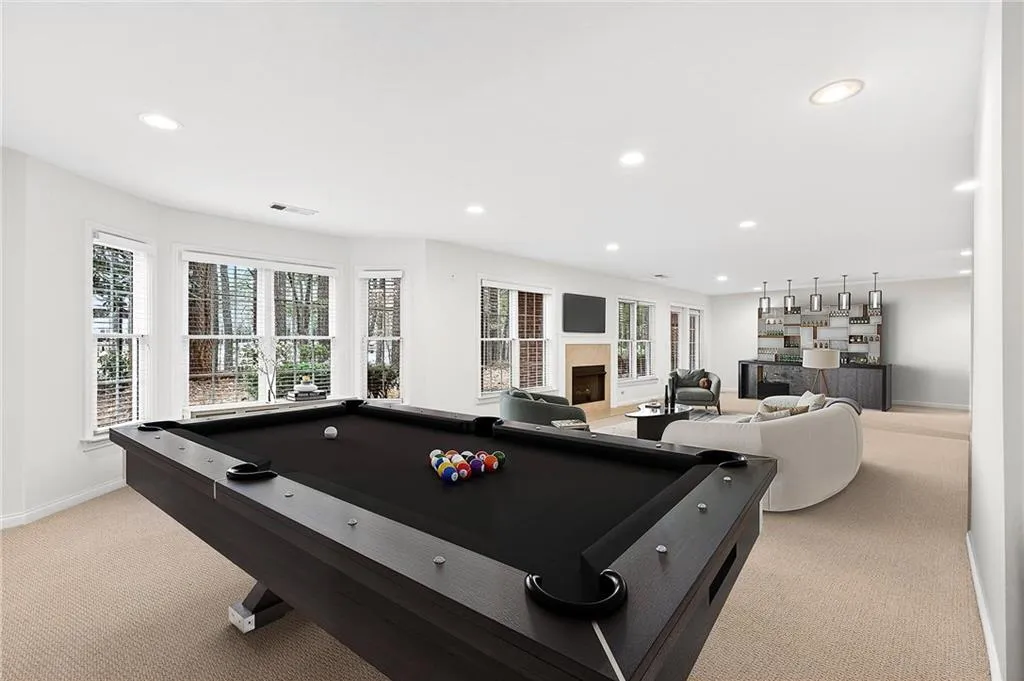 Enormous terrace level finished with outdoor access. Virtually staged