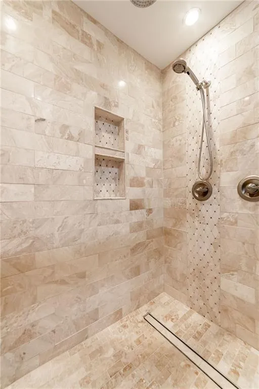 Bathroom with tiled shower