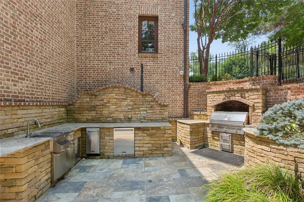 Walk out from the kitchen balcony above or straight through the terrace level to a sparkling pool.