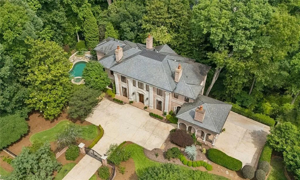 From above, the full magnificence of this Tuxedo Park estate reveals itself.