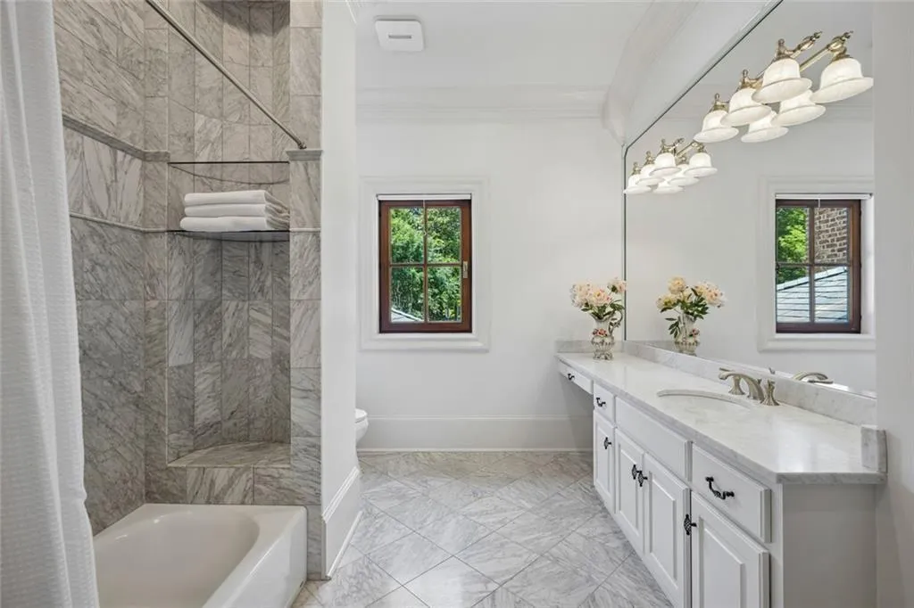 Even the secondary bathrooms are beautifully finished with marble tile.