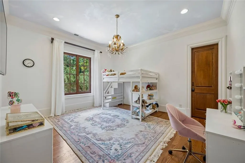 Spacious secondary bedrooms with hardwood floors.