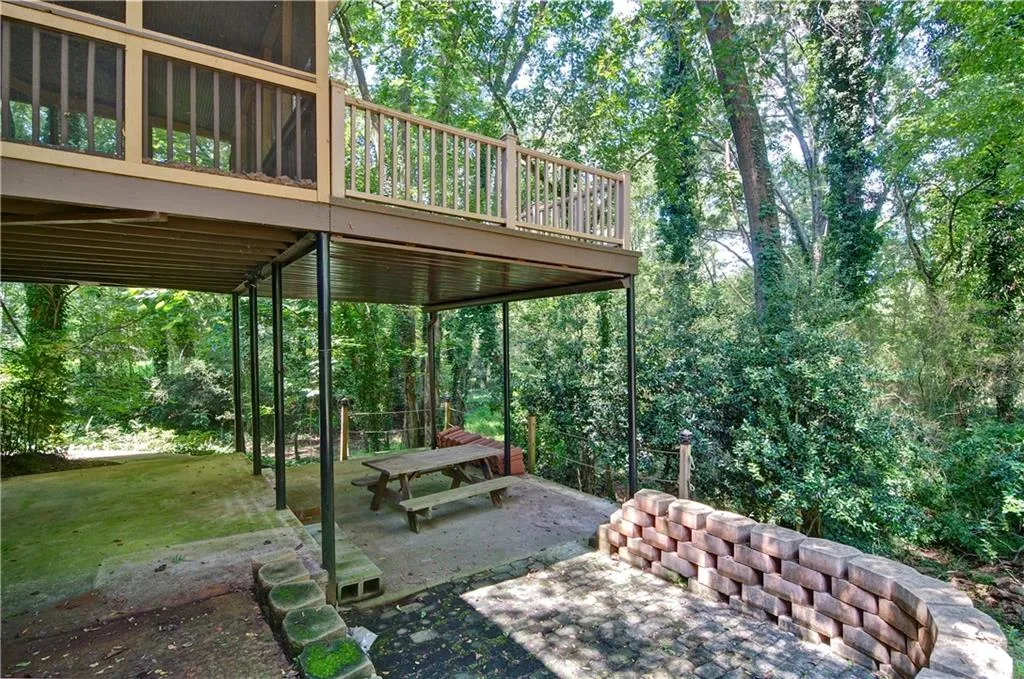 Look at how much outdoor entertainment space this home offers.  Not shown is the yard that connects all the way to Nancy Creek