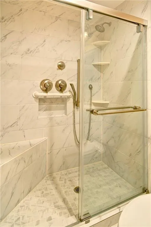 Gorgeous oversized shower located in basement bathroom