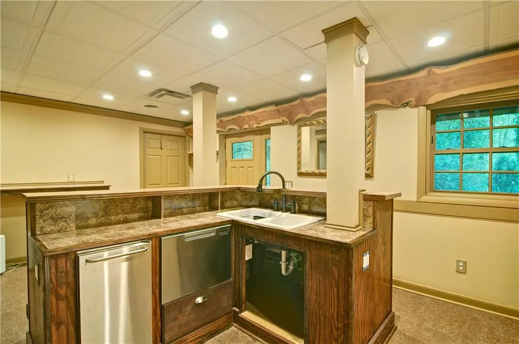 The bar offers a brand new never used full size dishwasher and a large commercial sized icemaker