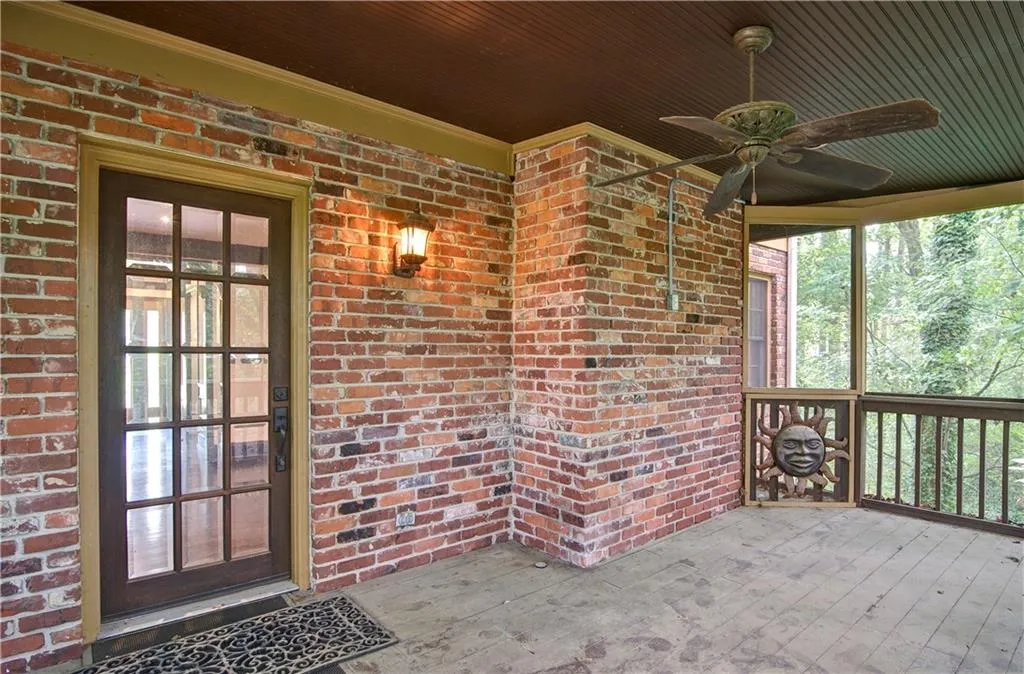 Game day will be enjoyed by on this screened in porch which opens to a large uncovered deck