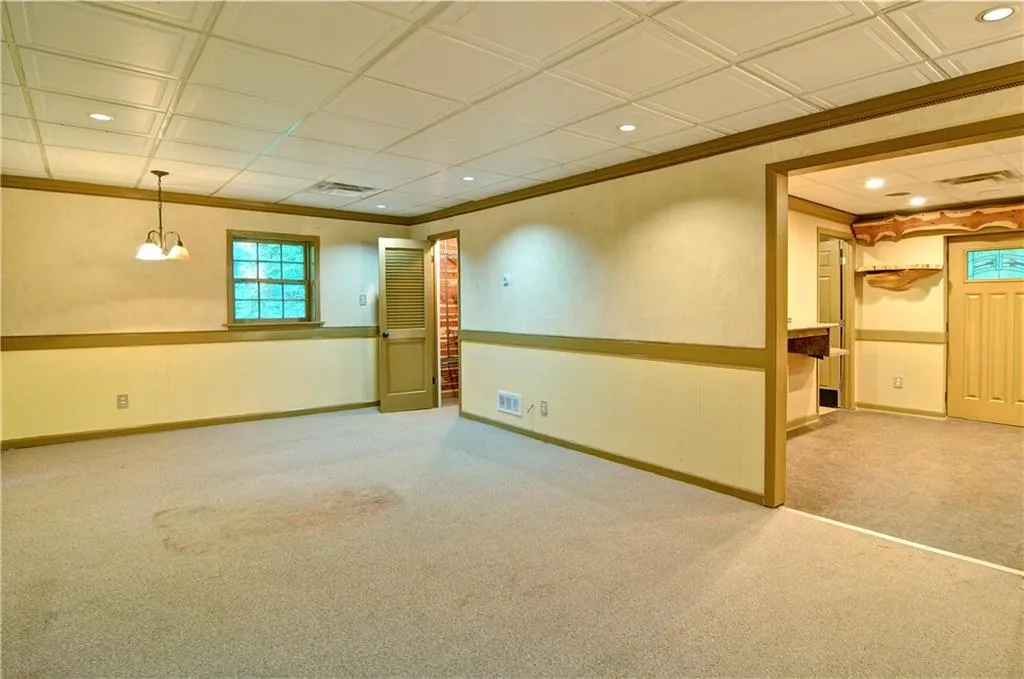 Full basement also offers crown molding throughout, recessed lighting and 2 additional storage rooms