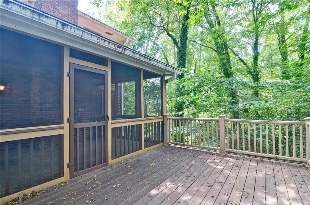 Large open deck just off the screened in deck