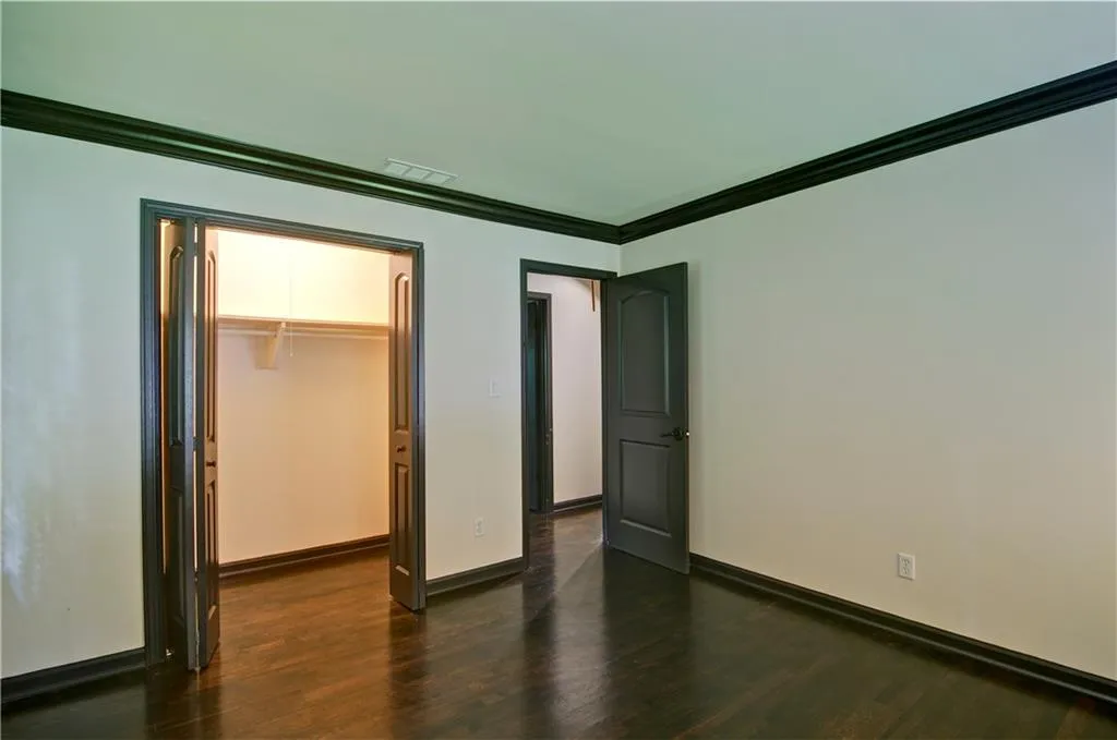 Another view of bedroom #3 showing a generous sized closet