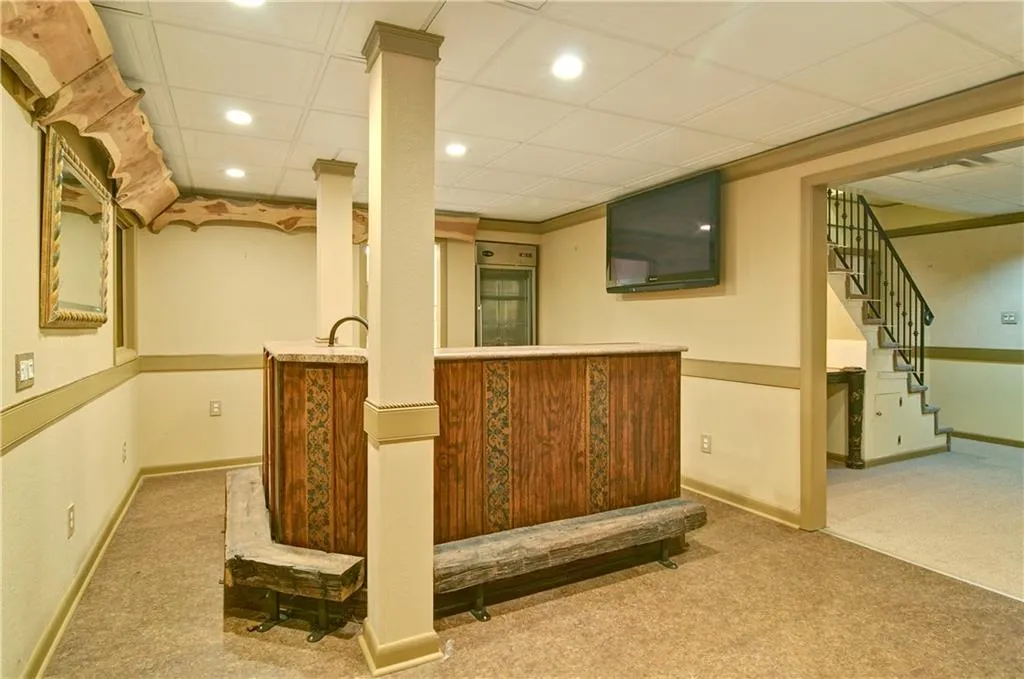 Another view of the bar with a large TV already in place