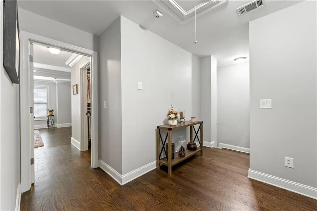 Hallway featuring dark hardwood / wood-style floors