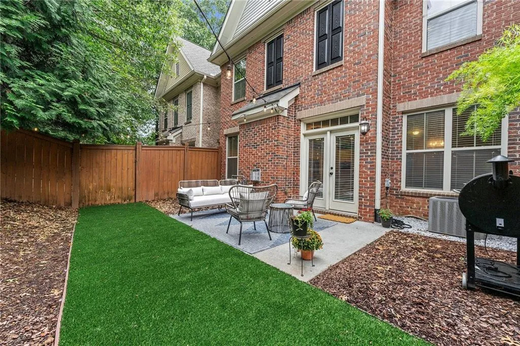 View of yard featuring a patio and an outdoor living space