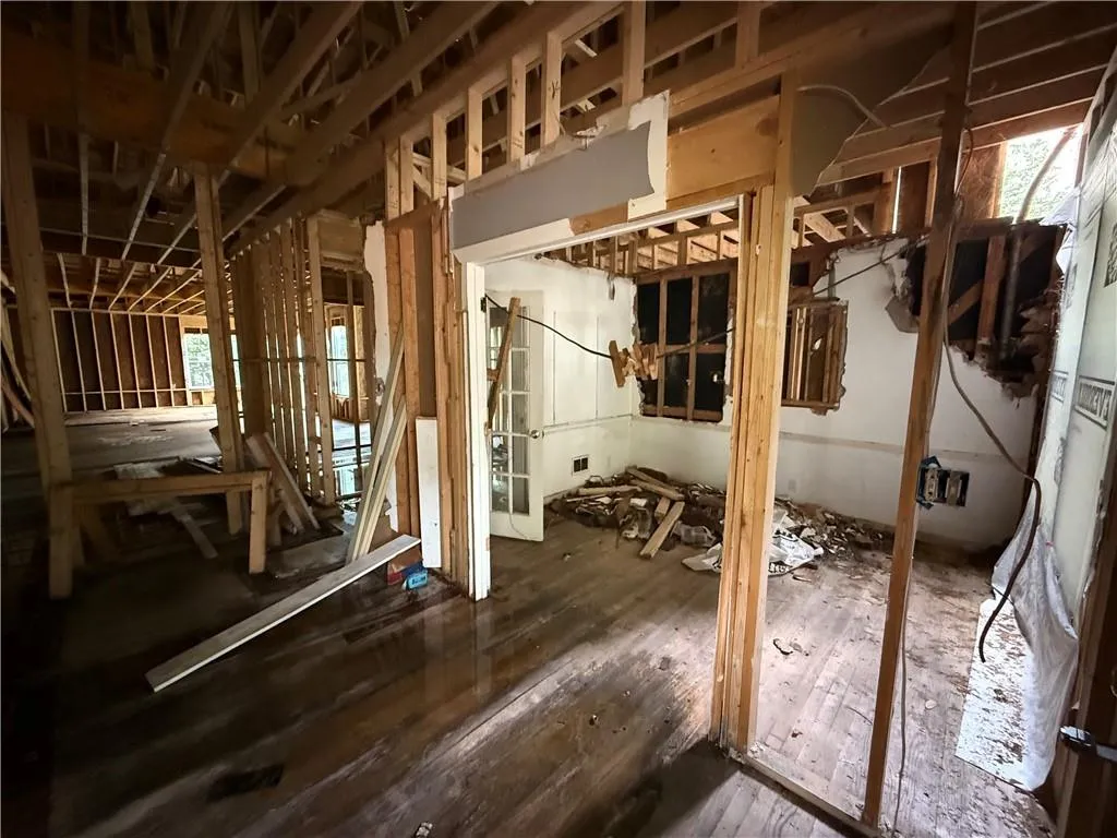 Misc room with plenty of natural light and wood-type flooring