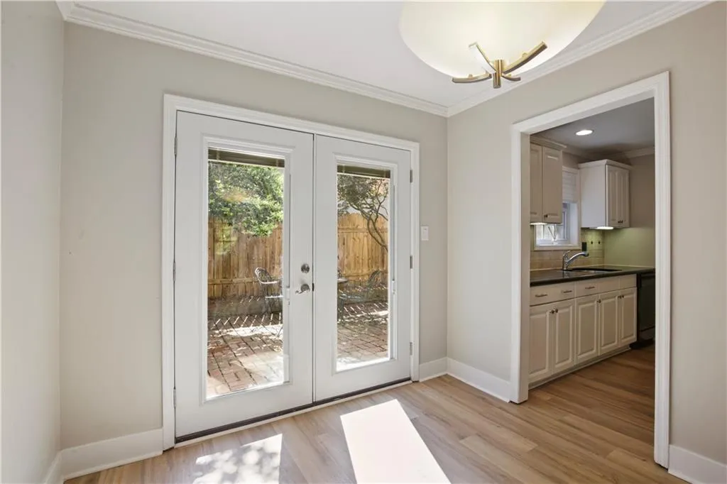 French doors from dining area to patio