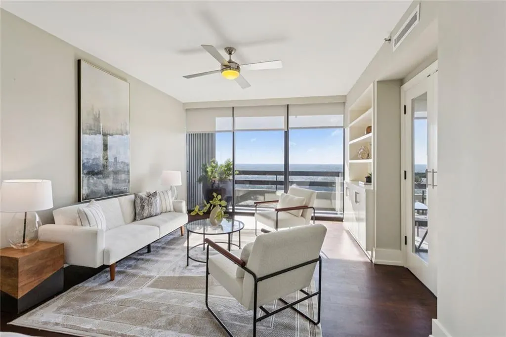 Den off the Living room with access to balcony.