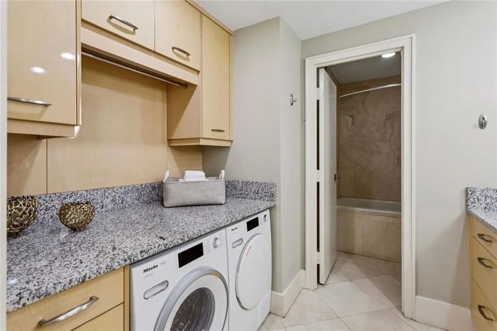 Side by Side Miele Washer/Dryer.