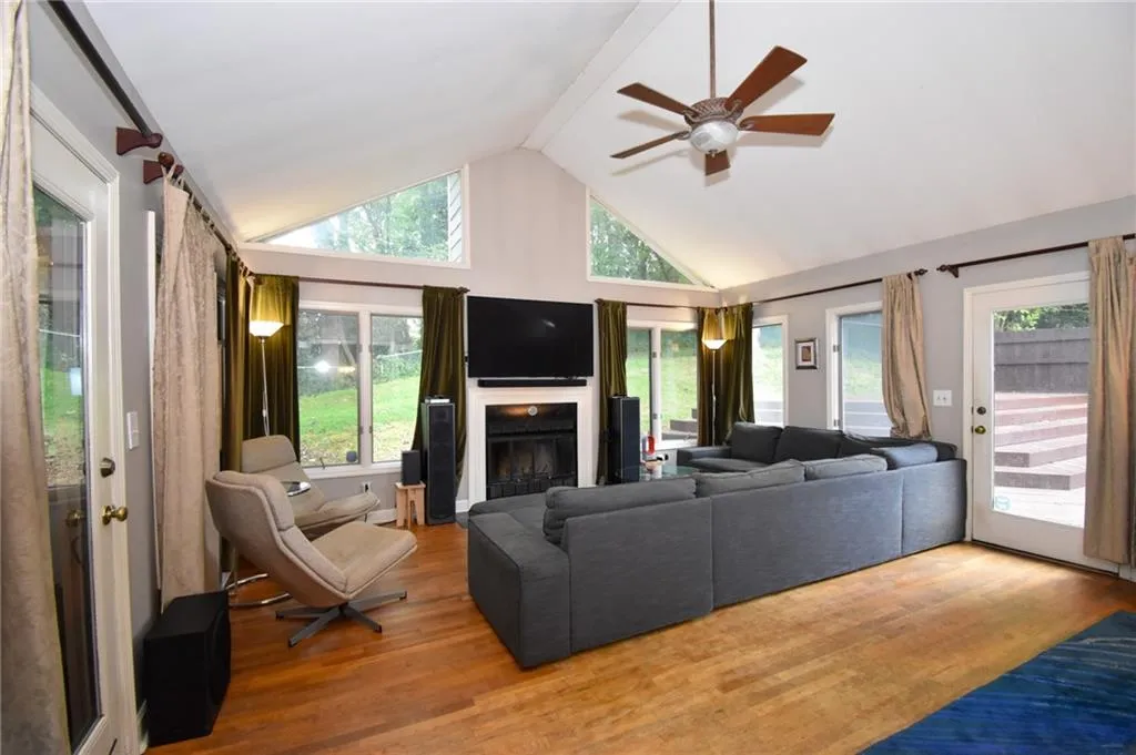 Large open family room with real wood fireplace