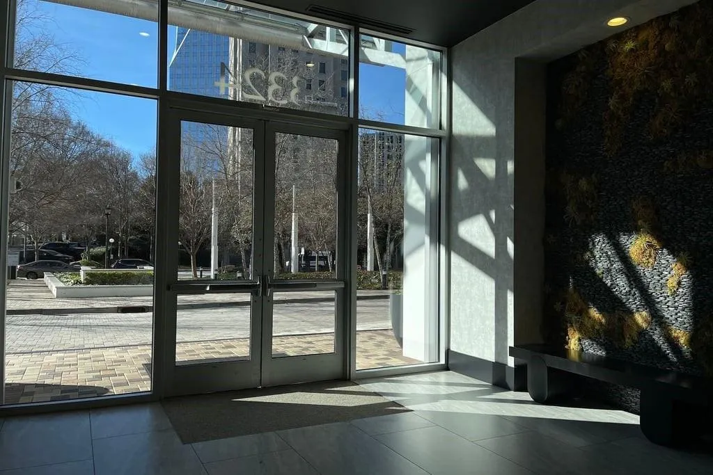 Community lobby with a wall of windows